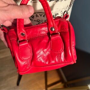 Mini leather duffle crossbody bag